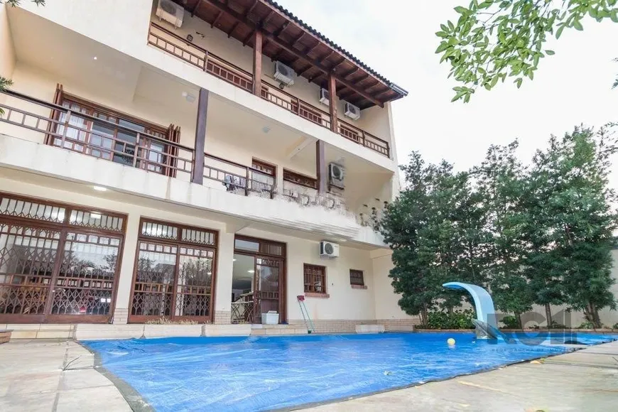 Foto 1 de Casa com 4 Quartos para alugar, 370m² em Vila Ipiranga, Porto Alegre