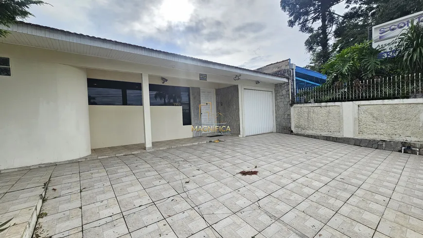 Foto 1 de Casa com 4 Quartos à venda, 164m² em Jardim Botânico, Curitiba