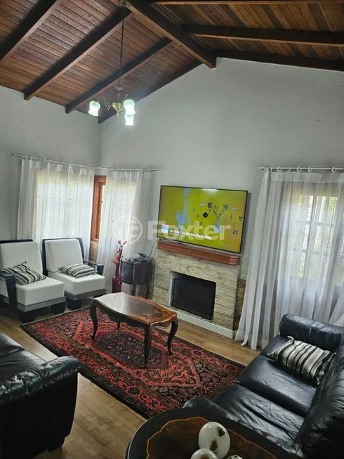 Foto 1 de Casa de Condomínio com 4 Quartos à venda, 234m² em Centro, Viamão