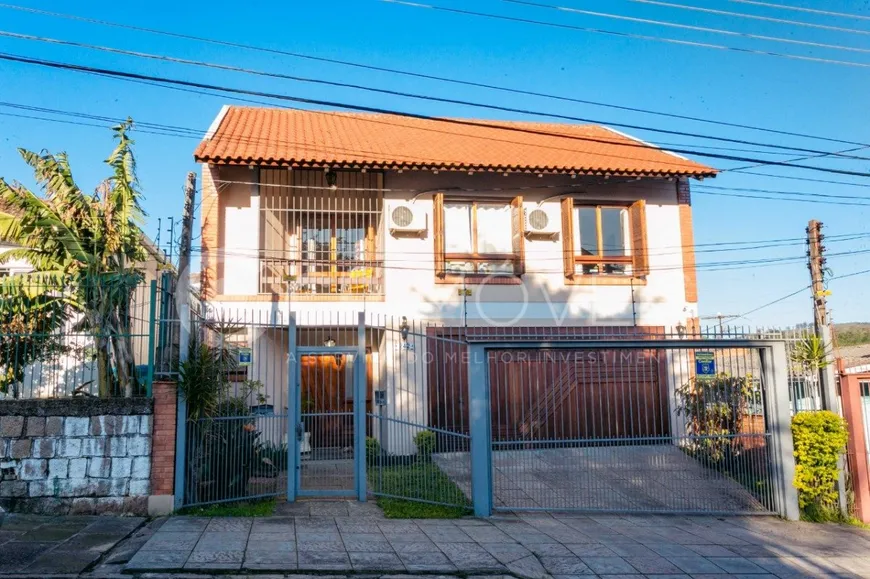 Foto 1 de Sobrado com 4 Quartos à venda, 320m² em Jardim Itú Sabará, Porto Alegre