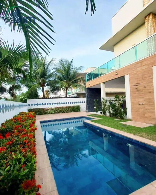 Foto 1 de Casa de Condomínio com 4 Quartos à venda, 275m² em Coacu, Eusébio