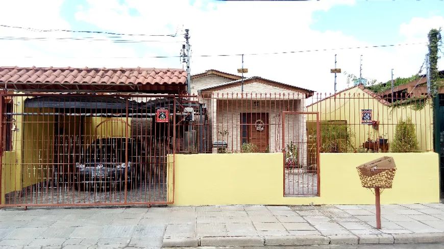 Foto 1 de Casa com 3 Quartos à venda, 144m² em Santa Fé, Porto Alegre