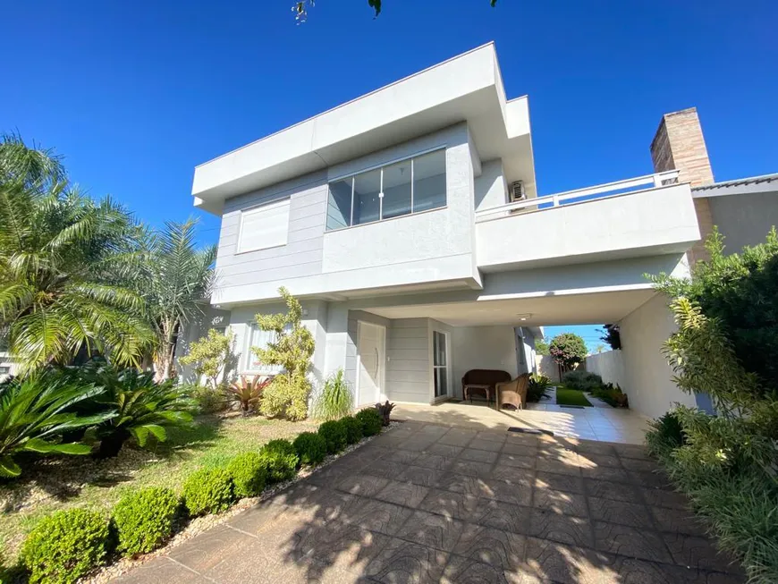 Foto 1 de Casa de Condomínio com 4 Quartos à venda, 280m² em Zona Nova, Capão da Canoa