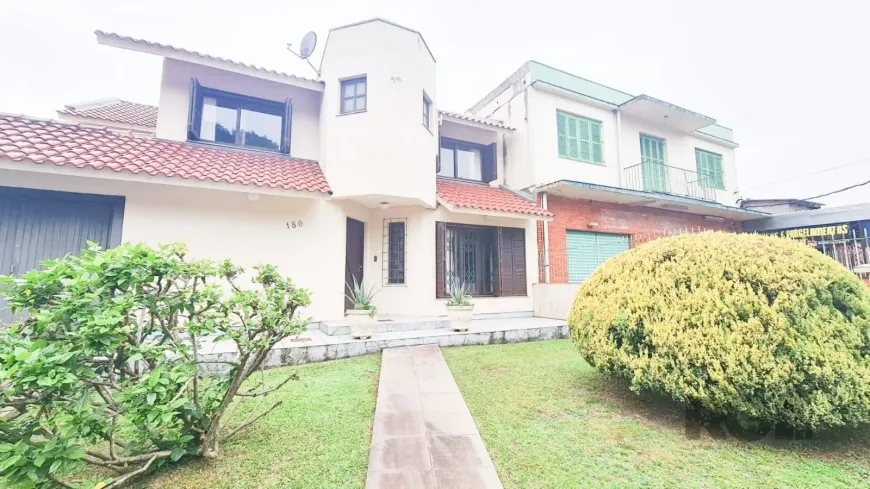 Foto 1 de Casa com 4 Quartos à venda, 319m² em Cristo Redentor, Porto Alegre