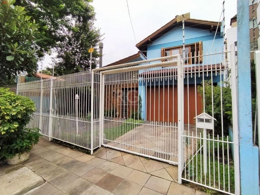 Foto 1 de Casa com 5 Quartos à venda, 430m² em Passo da Areia, Porto Alegre