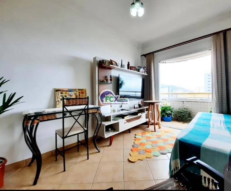 Foto 1 de Apartamento com 1 Quarto à venda, 71m² em Jardim Aguapeu, Mongaguá