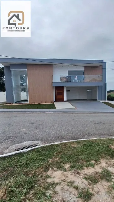 Foto 1 de Casa de Condomínio com 5 Quartos à venda, 447m² em Lagoa, Macaé