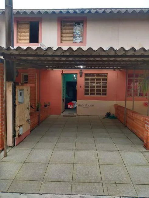 Foto 1 de Casa de Condomínio com 3 Quartos à venda, 47m² em Restinga, Porto Alegre