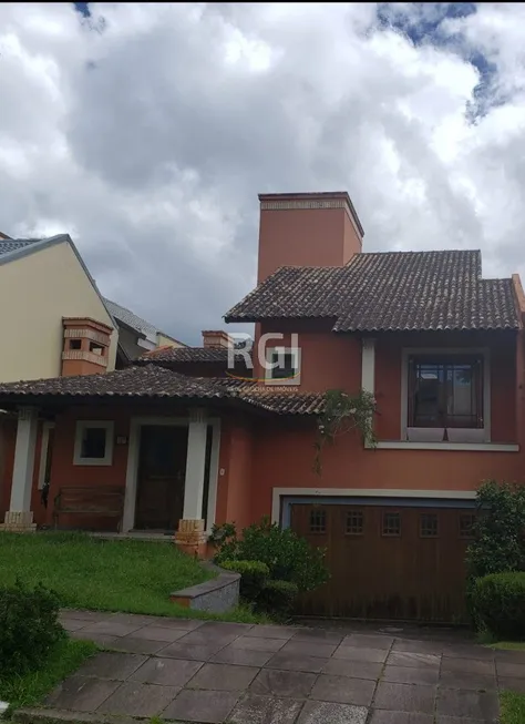 Foto 1 de Casa de Condomínio com 4 Quartos à venda, 236m² em Lomba do Pinheiro, Porto Alegre