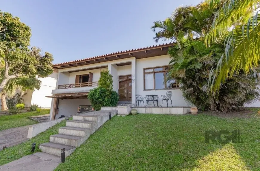 Foto 1 de Casa de Condomínio com 3 Quartos à venda, 450m² em Cavalhada, Porto Alegre