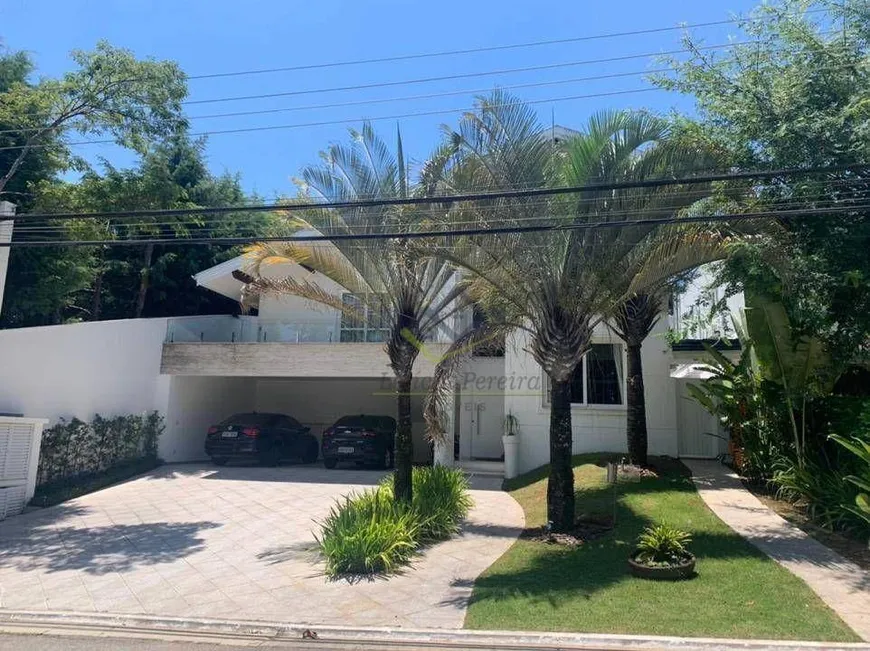 Foto 1 de Casa de Condomínio com 5 Quartos para venda ou aluguel, 517m² em Tamboré, Santana de Parnaíba