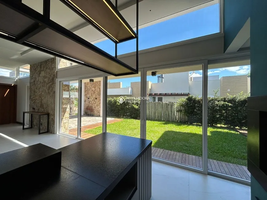 Foto 1 de Casa de Condomínio com 4 Quartos à venda, 230m² em Atlantida, Xangri-lá