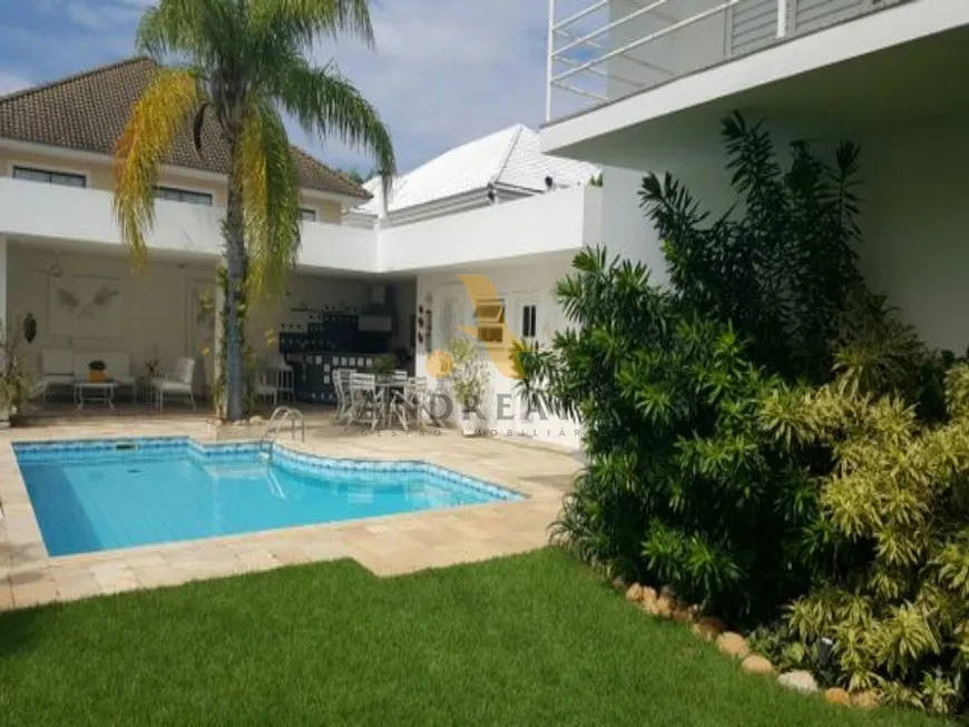 Foto 1 de Casa de Condomínio com 4 Quartos à venda, 600m² em Barra da Tijuca, Rio de Janeiro