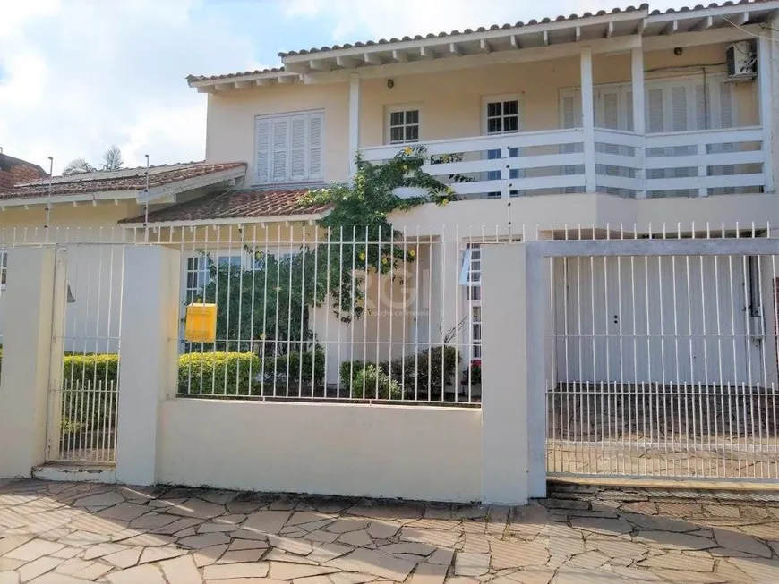 Foto 1 de Casa com 3 Quartos à venda, 263m² em Vila Nova, Porto Alegre