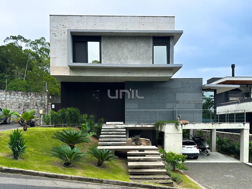 Foto 1 de Casa de Condomínio com 3 Quartos à venda, 541m² em Cacupé, Florianópolis
