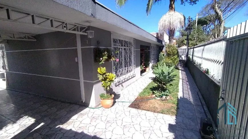 Foto 1 de Casa com 4 Quartos à venda, 235m² em Boa Vista, Curitiba
