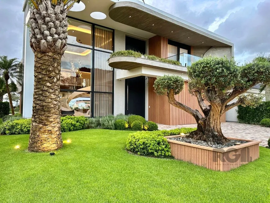 Foto 1 de Casa de Condomínio com 5 Quartos à venda, 349m² em Velas da Marina, Capão da Canoa