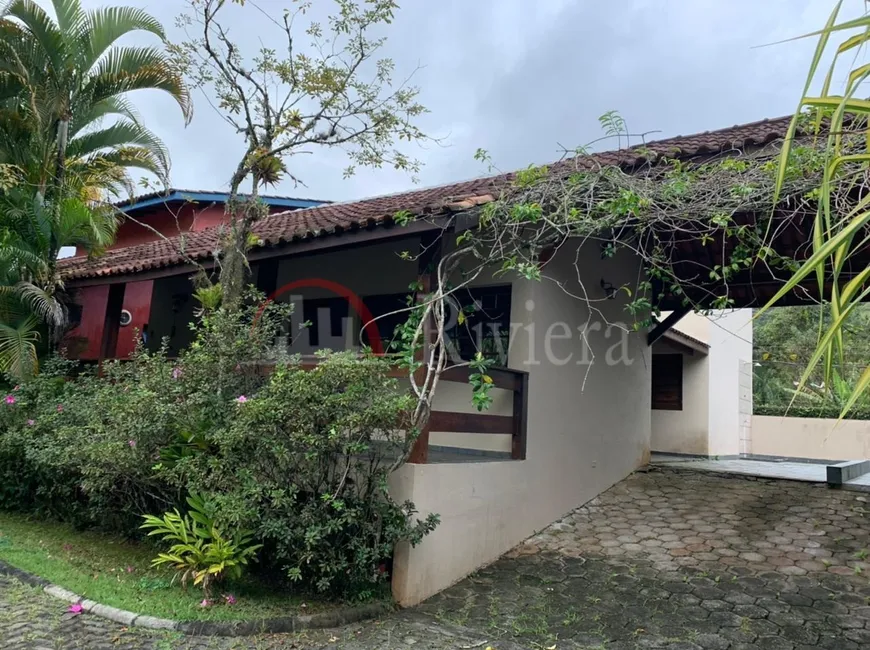 Foto 1 de Casa de Condomínio com 4 Quartos à venda, 150m² em Camburizinho, São Sebastião