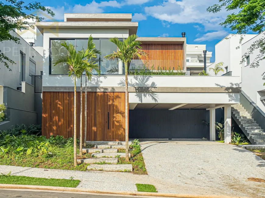 Foto 1 de Casa de Condomínio com 4 Quartos à venda, 451m² em Alphaville Dom Pedro, Campinas
