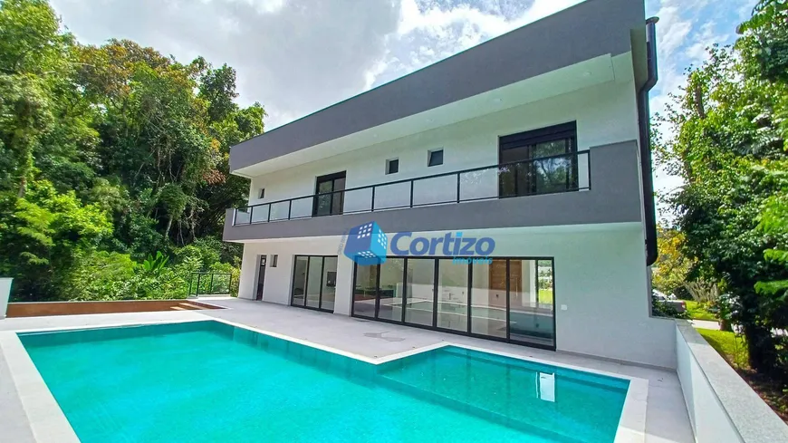 Foto 1 de Casa de Condomínio com 4 Quartos à venda, 540m² em Balneário Praia do Perequê , Guarujá