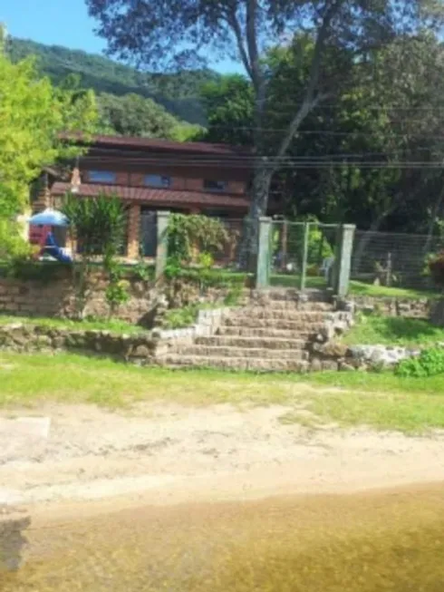 Foto 1 de Casa com 2 Quartos à venda, 140m² em Lagoa da Conceição, Florianópolis