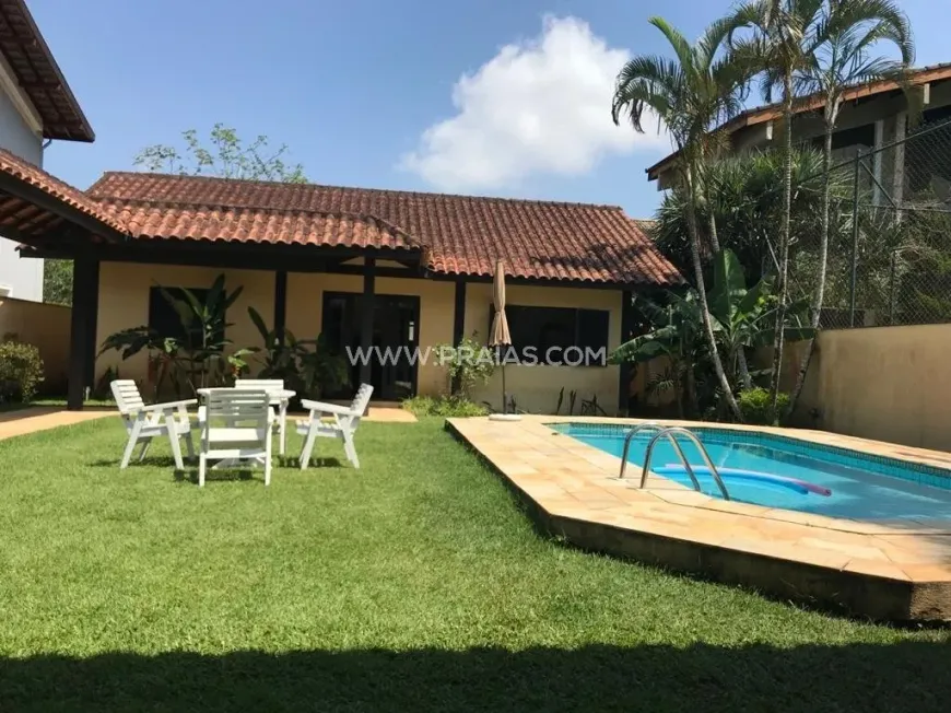 Foto 1 de Casa de Condomínio com 4 Quartos à venda, 250m² em Balneário Praia do Pernambuco, Guarujá