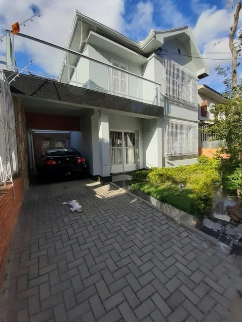 Foto 1 de Casa com 4 Quartos à venda, 250m² em Azenha, Porto Alegre