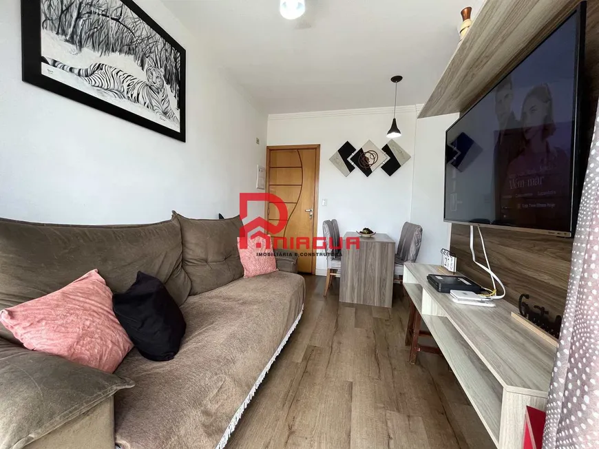 Foto 1 de Apartamento com 2 Quartos à venda, 58m² em Vila Guilhermina, Praia Grande