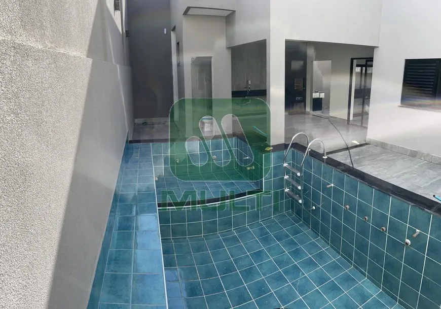 Foto 1 de Casa com 3 Quartos à venda, 140m² em Alto Umuarama, Uberlândia