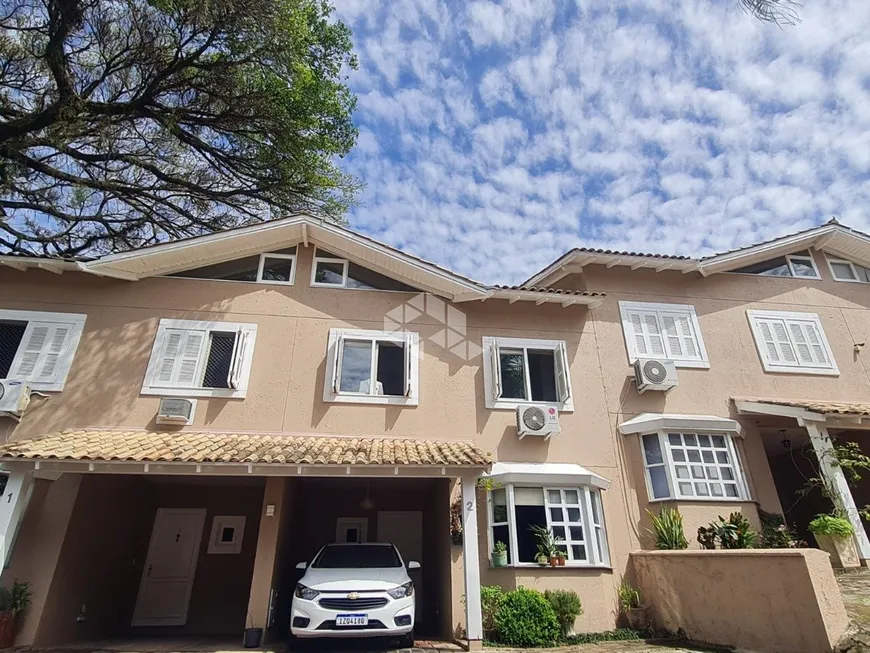 Foto 1 de Casa de Condomínio com 3 Quartos à venda, 107m² em Santa Tereza, Porto Alegre