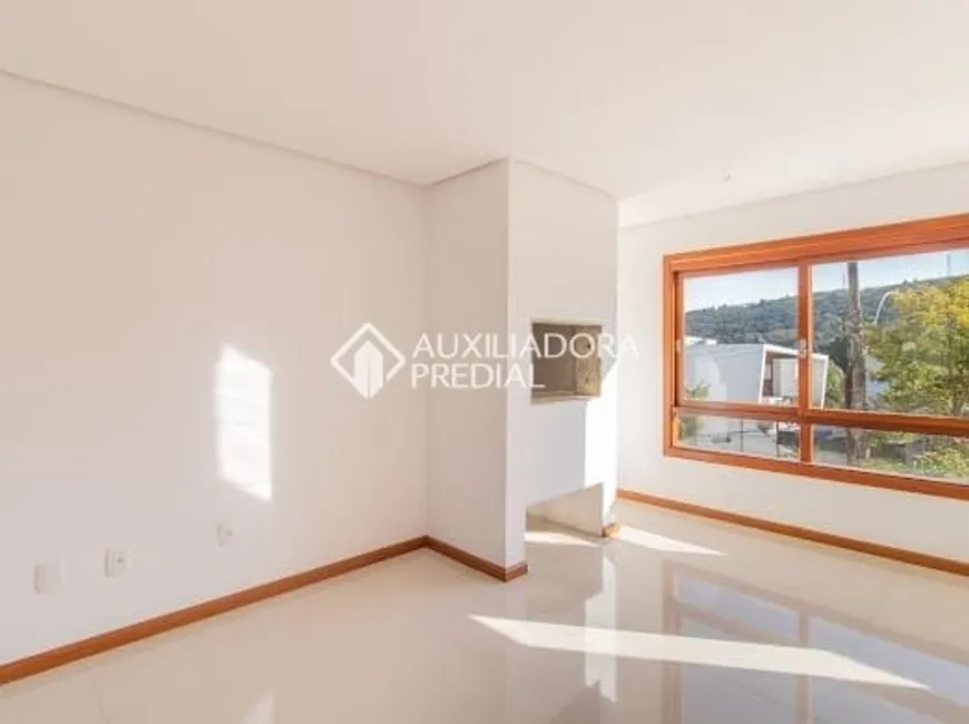 Foto 1 de Casa de Condomínio com 3 Quartos à venda, 170m² em Vila Nova, Porto Alegre