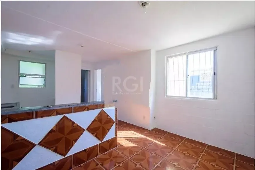 Foto 1 de Apartamento com 2 Quartos à venda, 42m² em Vila Nova, Porto Alegre