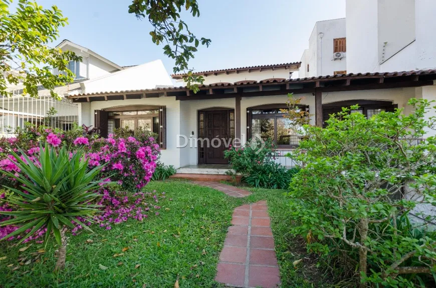 Foto 1 de Casa com 4 Quartos à venda, 250m² em Tristeza, Porto Alegre