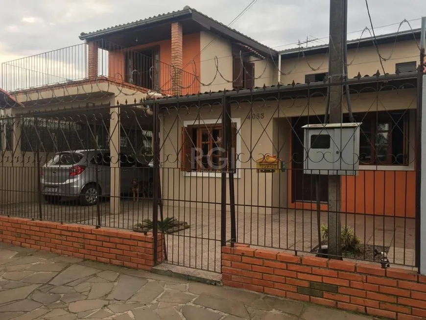 Foto 1 de Sobrado com 3 Quartos à venda, 91m² em Restinga Nova, Porto Alegre