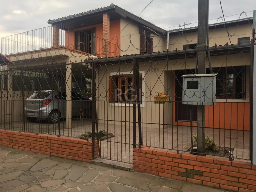 Foto 1 de Sobrado com 3 Quartos à venda, 93m² em Restinga Nova, Porto Alegre