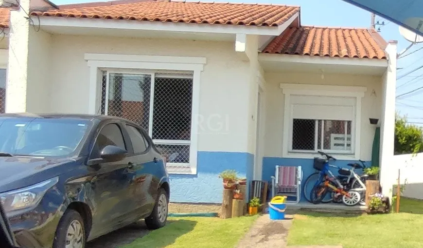 Foto 1 de Casa de Condomínio com 3 Quartos à venda, 57m² em Aberta dos Morros, Porto Alegre