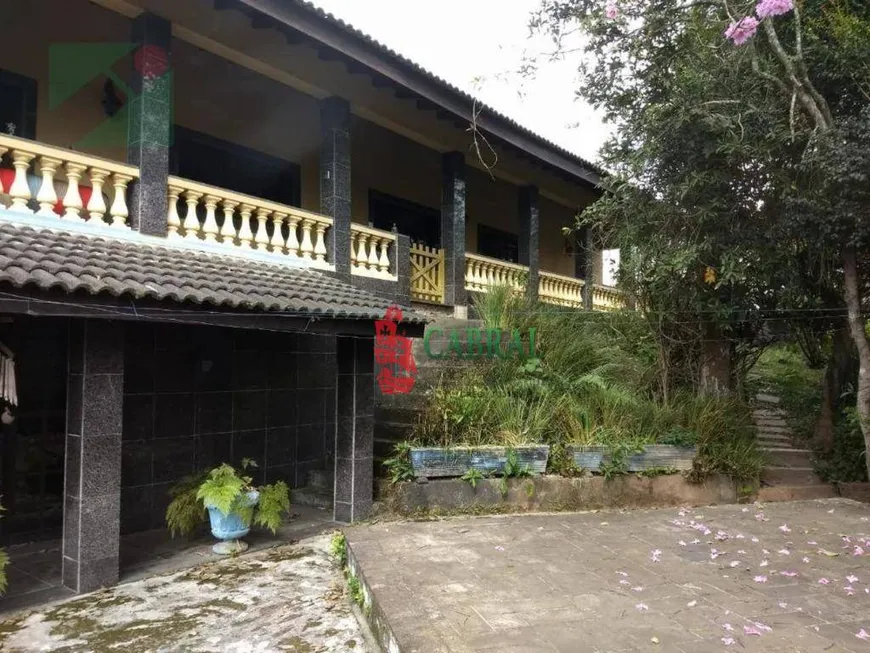 Foto 1 de Casa de Condomínio com 6 Quartos à venda, 600m² em Caputera, Arujá