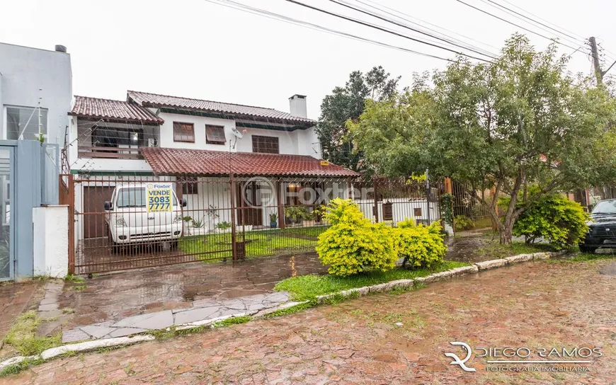 Foto 1 de Casa com 4 Quartos à venda, 260m² em Partenon, Porto Alegre