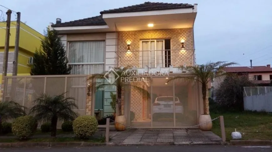 Foto 1 de Casa com 3 Quartos à venda, 266m² em Mário Quintana, Porto Alegre