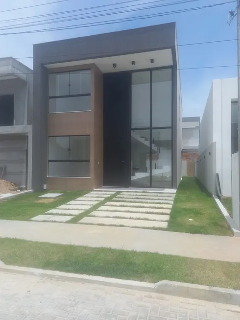 Foto 1 de Casa de Condomínio com 4 Quartos à venda, 161m² em Abrantes, Camaçari