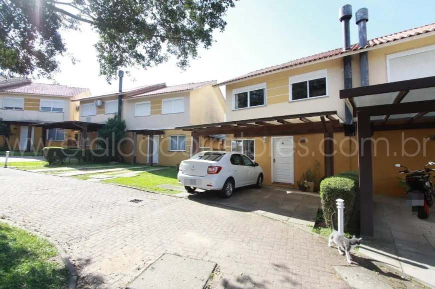 Foto 1 de Casa de Condomínio com 3 Quartos à venda, 175m² em Mário Quintana, Porto Alegre