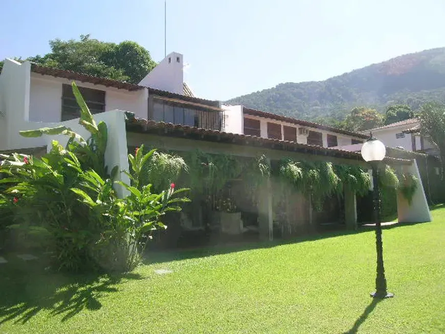 Foto 1 de Casa com 4 Quartos à venda, 673m² em Barra da Tijuca, Rio de Janeiro