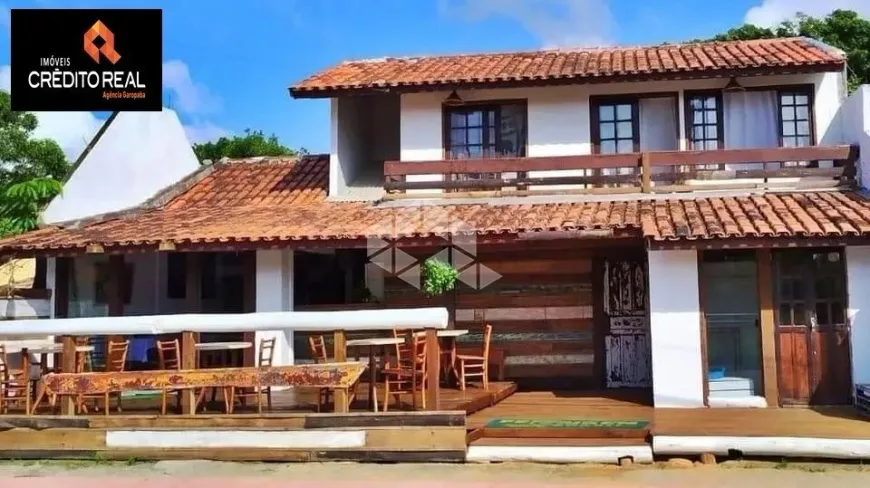 Foto 1 de Casa com 6 Quartos à venda, 250m² em Praia da Ferrugem, Garopaba