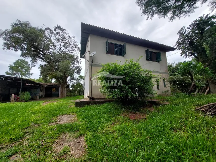 Foto 1 de Casa com 5 Quartos à venda, 200m² em Querência, Viamão