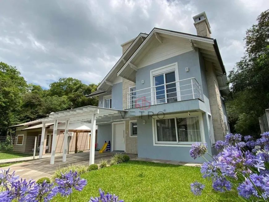 Foto 1 de Casa de Condomínio com 4 Quartos à venda, 266m² em Vivendas do Arvoredo, Gramado