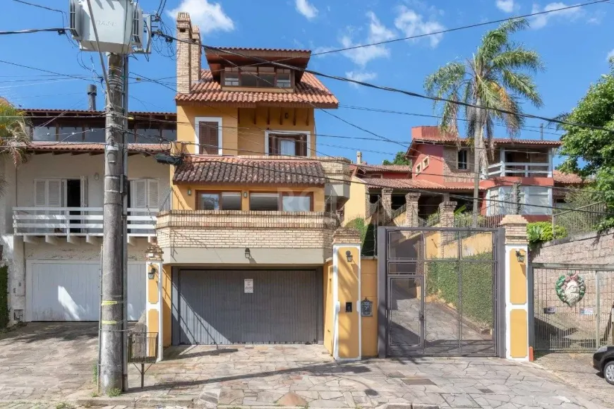 Foto 1 de Casa de Condomínio com 3 Quartos à venda, 210m² em Jardim Isabel, Porto Alegre