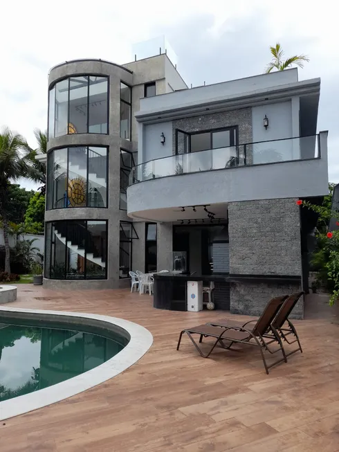 Foto 1 de Casa de Condomínio com 6 Quartos à venda, 950m² em Barra da Tijuca, Rio de Janeiro