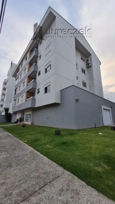 Foto 1 de Apartamento com 2 Quartos à venda, 61m² em Morrotes, Tubarão