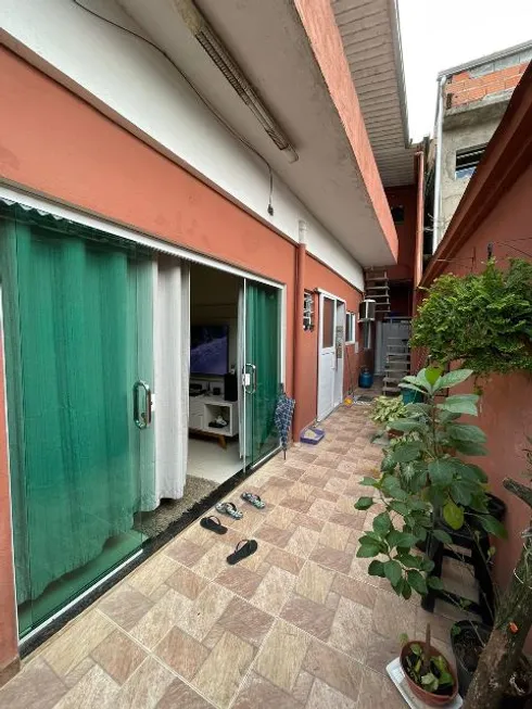 Foto 1 de Casa com 4 Quartos à venda, 150m² em Melvi, Praia Grande