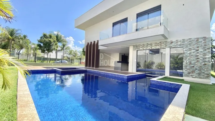 Foto 1 de Casa de Condomínio com 5 Quartos à venda, 512m² em Residencial Alphaville Flamboyant, Goiânia